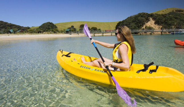 People kayaking in New Zealand