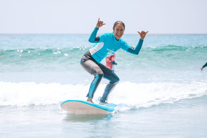 Te Arai learn to surf